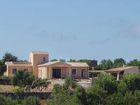 General view of the building, three wings and tower